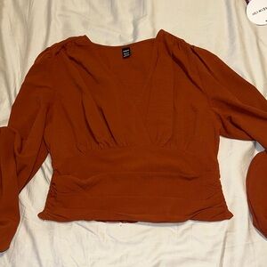 Beautiful rust color crop blouse